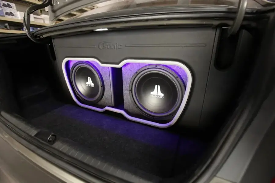 Which way to face subwoofer in trunk