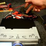 how to get rid of engine noise in car stereo