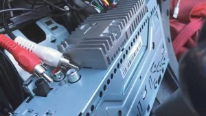 whining noise from speakers when accelerating