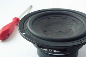 why is my car speaker crackling